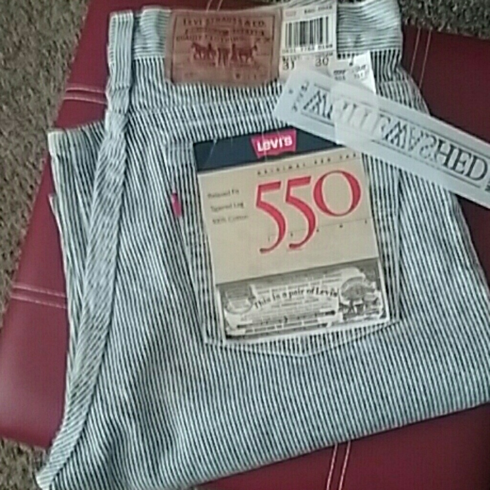 Levi's 550 whitewashed Pinstriped jeans.